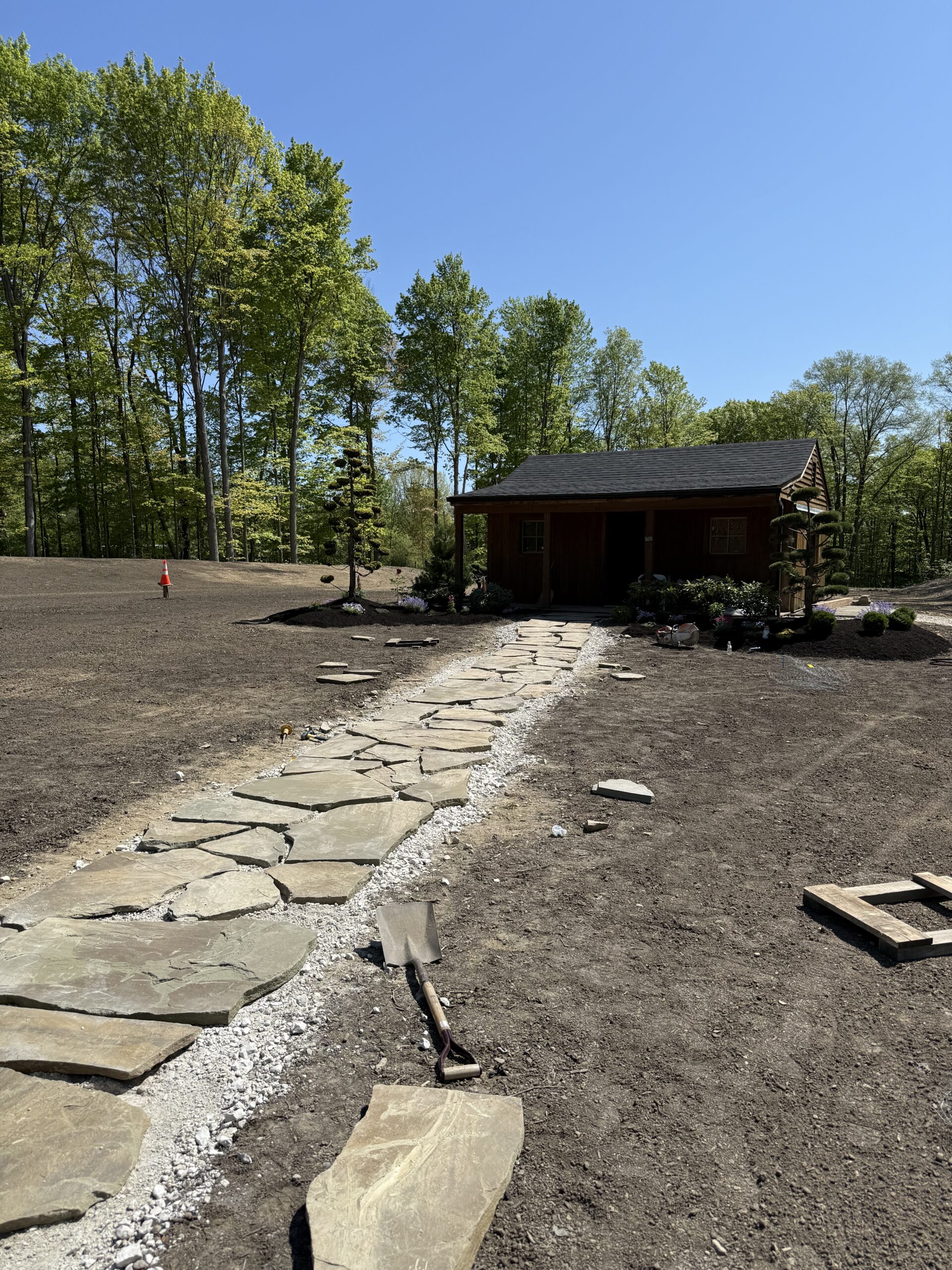 Premium stamped concrete and hardscape installation by Tiny Construction LLC Avon Ohio